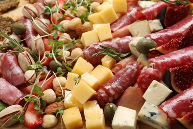 Photo of Different tasty appetizers as background, closeup view