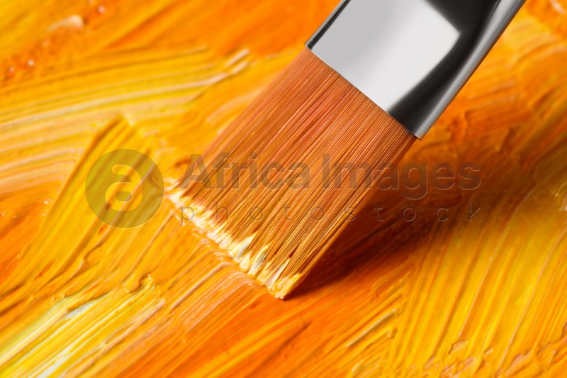 Photo of Painting beautiful strokes of colorful oil paints, closeup