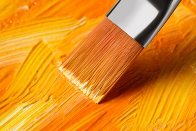 Painting beautiful strokes of colorful oil paints, closeup