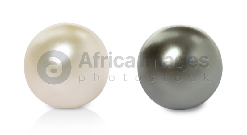 Two beautiful pearls on white background, closeup. Banner design