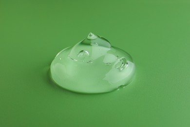 Sample of transparent gel on green background