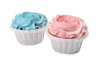 Photo of Baby shower cupcakes with light blue and pink cream on white background