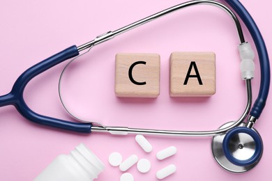 Photo of Stethoscope, pills and calcium symbol made of wooden cubes with letters on pink background, flat lay