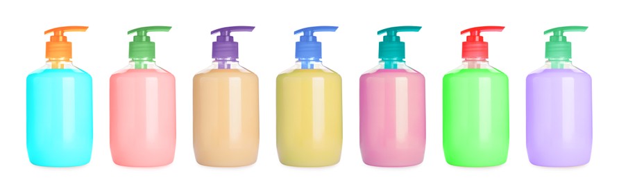 Set with bottles of multicolored liquid soap on white background. Banner design