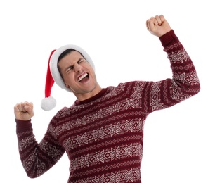 Excited man wearing Santa hat on white background