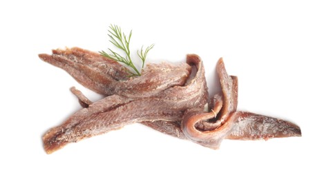 Photo of Heap of delicious anchovy fillets and dill on white background, top view