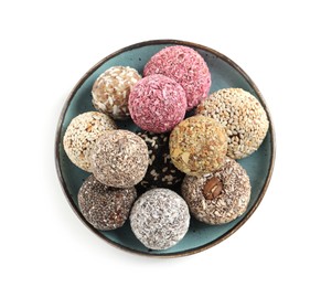 Different delicious vegan candy balls on white background, top view