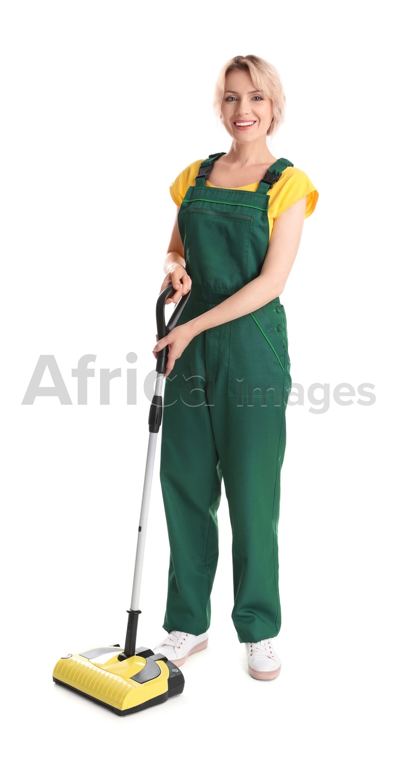 Photo of Female janitor with cordless broom on white background. Cleaning service