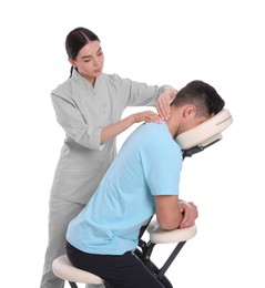 Man receiving massage in modern chair on white background
