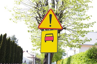 Traffic signs Place Of Privileged Vehicles Exit and Other Danger on city street
