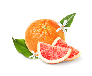 Whole and cut grapefruits on white background