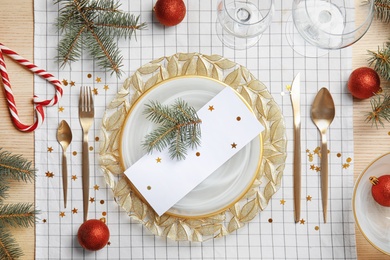 Elegant table setting on cloth, top view. Christmas celebration