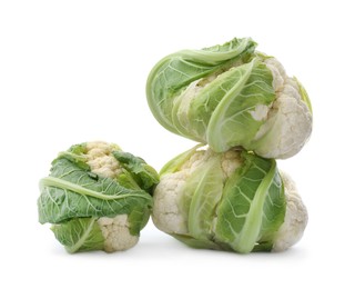 Photo of Whole fresh raw cauliflowers isolated on white