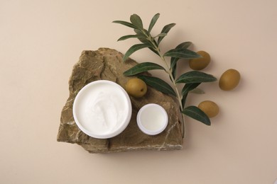 Photo of Flat lay composition with different natural cosmetic products on beige background