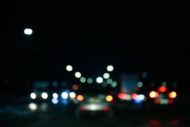 Blurred view of city at night. Bokeh effect