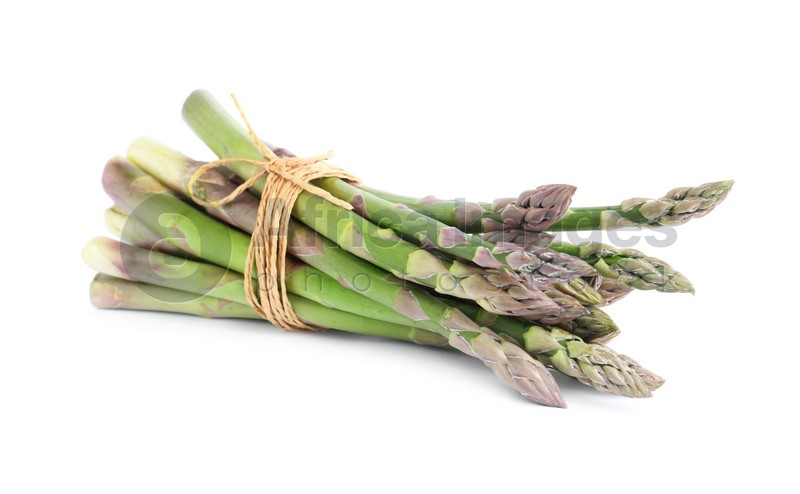 Bunch of fresh raw asparagus isolated on white. Healthy eating