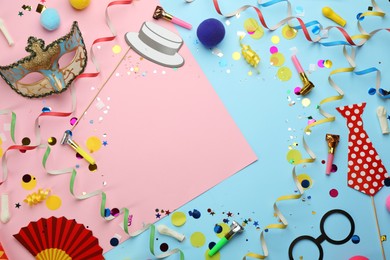 Frame of carnival items on color background, flat lay. Space for text