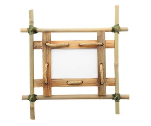 Empty frame made of bamboo sticks and wooden planks isolated on white