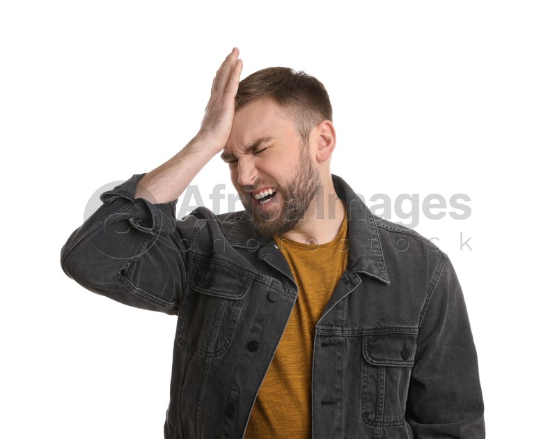 Photo of Portrait of emotional young man on white background. Personality concept
