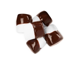 Tasty marshmallows dipped into chocolate on white background, top view