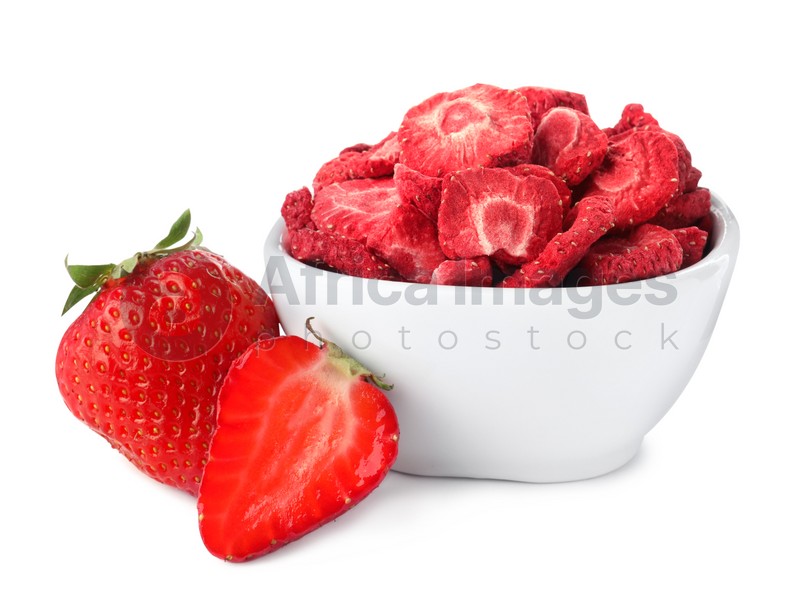 Sweet sublimated and fresh strawberries on white background
