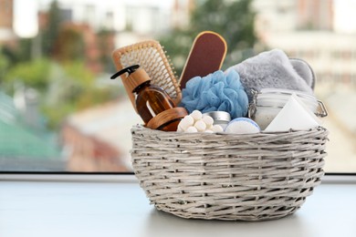 Spa gift set with different products on window sill