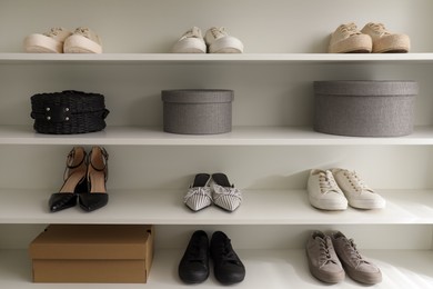 Storage rack with stylish women's shoes and accessories