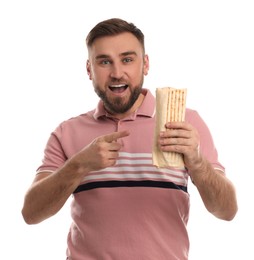 Excited young man with delicious shawarma on white background