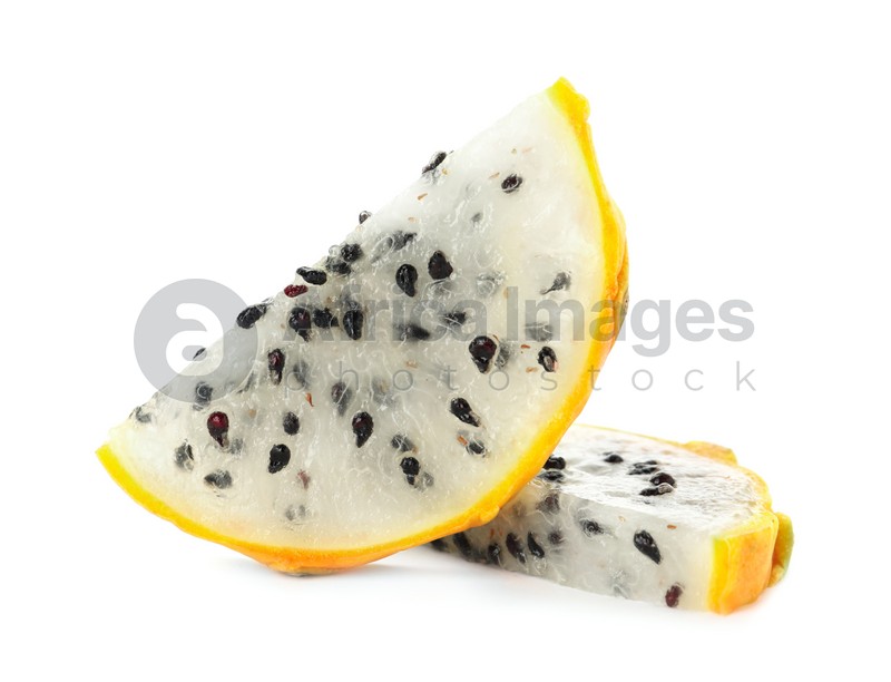 Photo of Slices of delicious yellow pitahaya fruit on white background