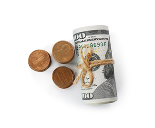 Roll of dollar bills tied with rope and coins isolated on white, top view
