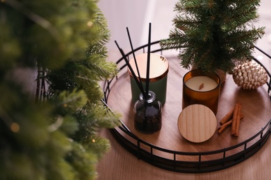 Composition with decorative Christmas tree on wooden table