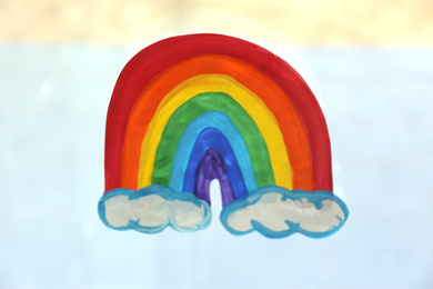 Picture of rainbow on window glass, closeup. Stay at home concept