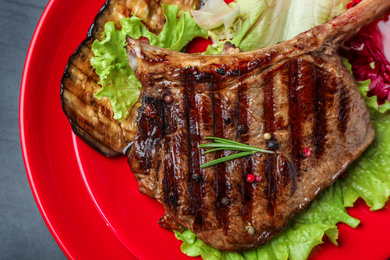 Top view of delicious grilled beef steak on table