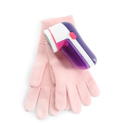 Photo of Modern fabric shaver and woolen gloves on white background, top view
