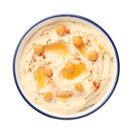 Bowl of tasty hummus with chickpeas and paprika isolated on white, top view