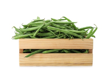 Fresh green beans in wooden crate on white background