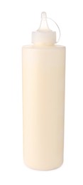 Plastic bottle of tasty mayonnaise isolated on white