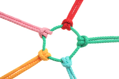 Colorful ropes tied together on white background. Unity concept