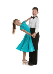 Beautifully dressed couple of kids dancing on white background
