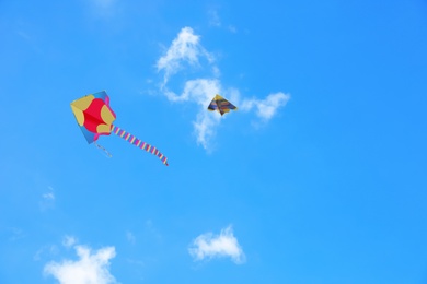 Beautiful kites drifting in blue sky