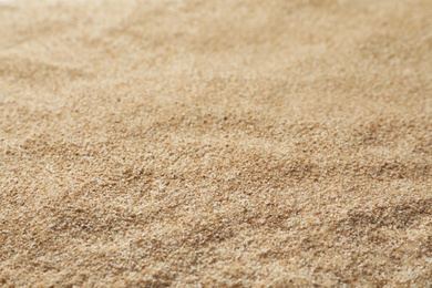 Buckwheat flour as background, closeup. Gluten free product