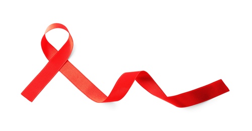 Red ribbon isolated on white, top view. AIDS disease awareness