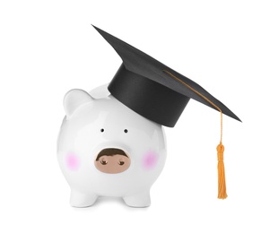 Piggy bank in graduation hat with gold tassel isolated on white