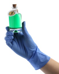 Woman in gloves holding glass bottle of poison with warning sign isolated on white, closeup