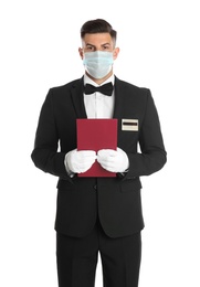 Waiter in medical face mask with menu on white background
