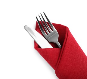 Fork and knife wrapped in red napkin on white background, top view