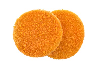 Delicious fried breaded cutlets on white background, top view