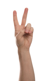 Photo of Man showing peace sign against white background, closeup of hand