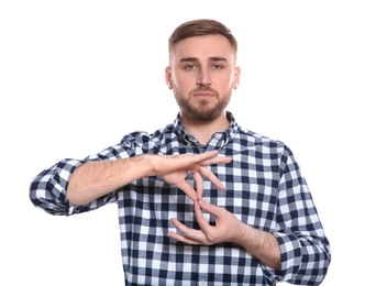 Photo of Man showing word INTERPRETER in sign language on white background