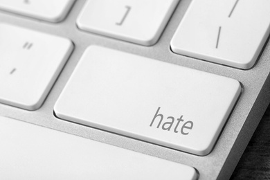 Button with text Hate on computer keyboard, closeup